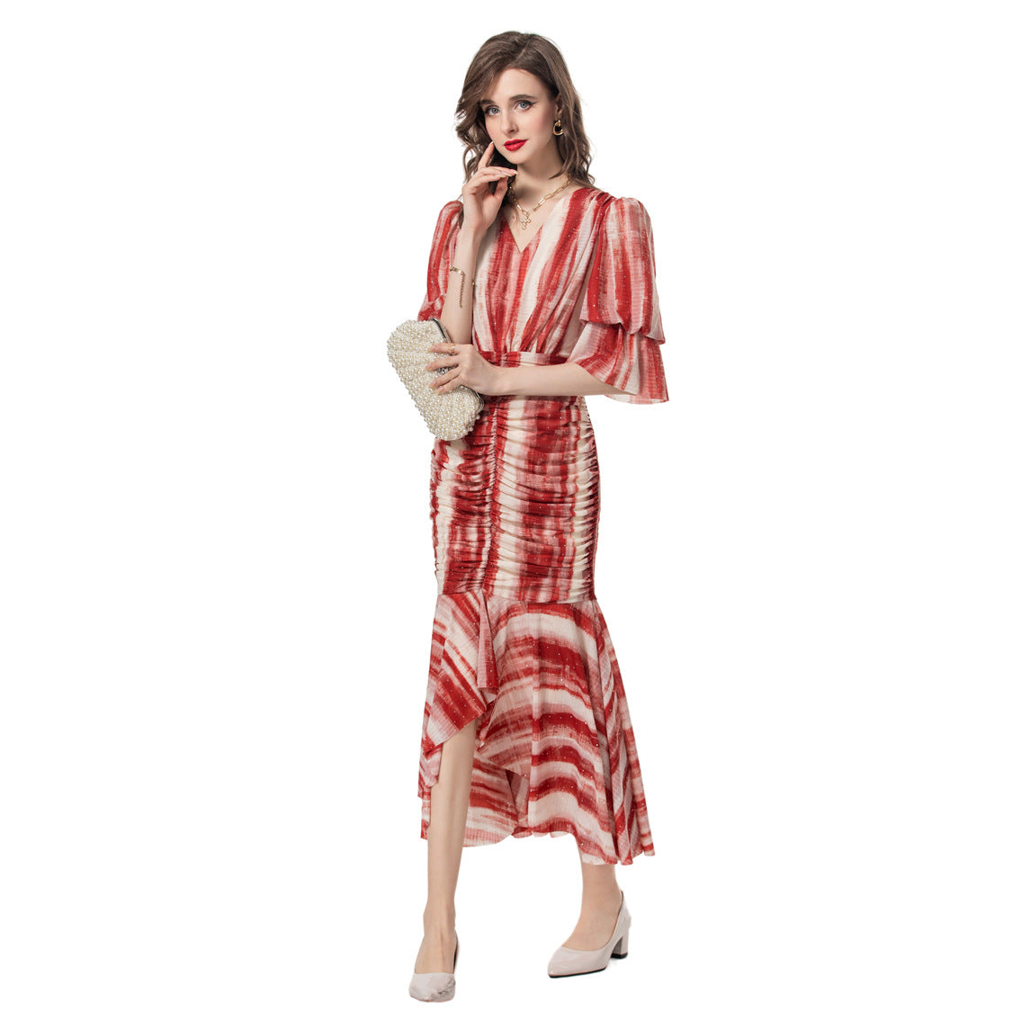 Summer fashion outfit with fashionable printed fish tail and hip bag dress