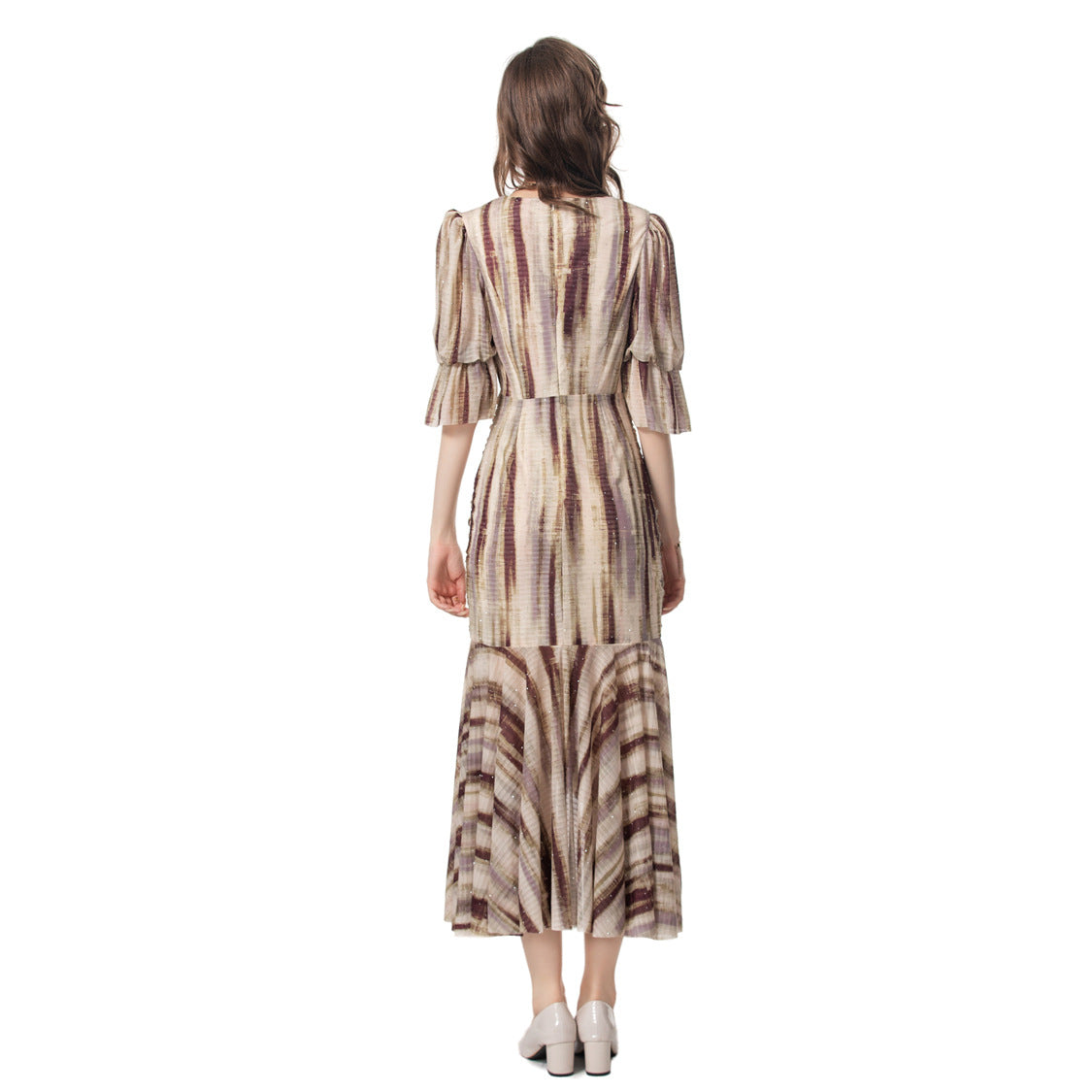 Summer fashion outfit with fashionable printed fish tail and hip bag dress