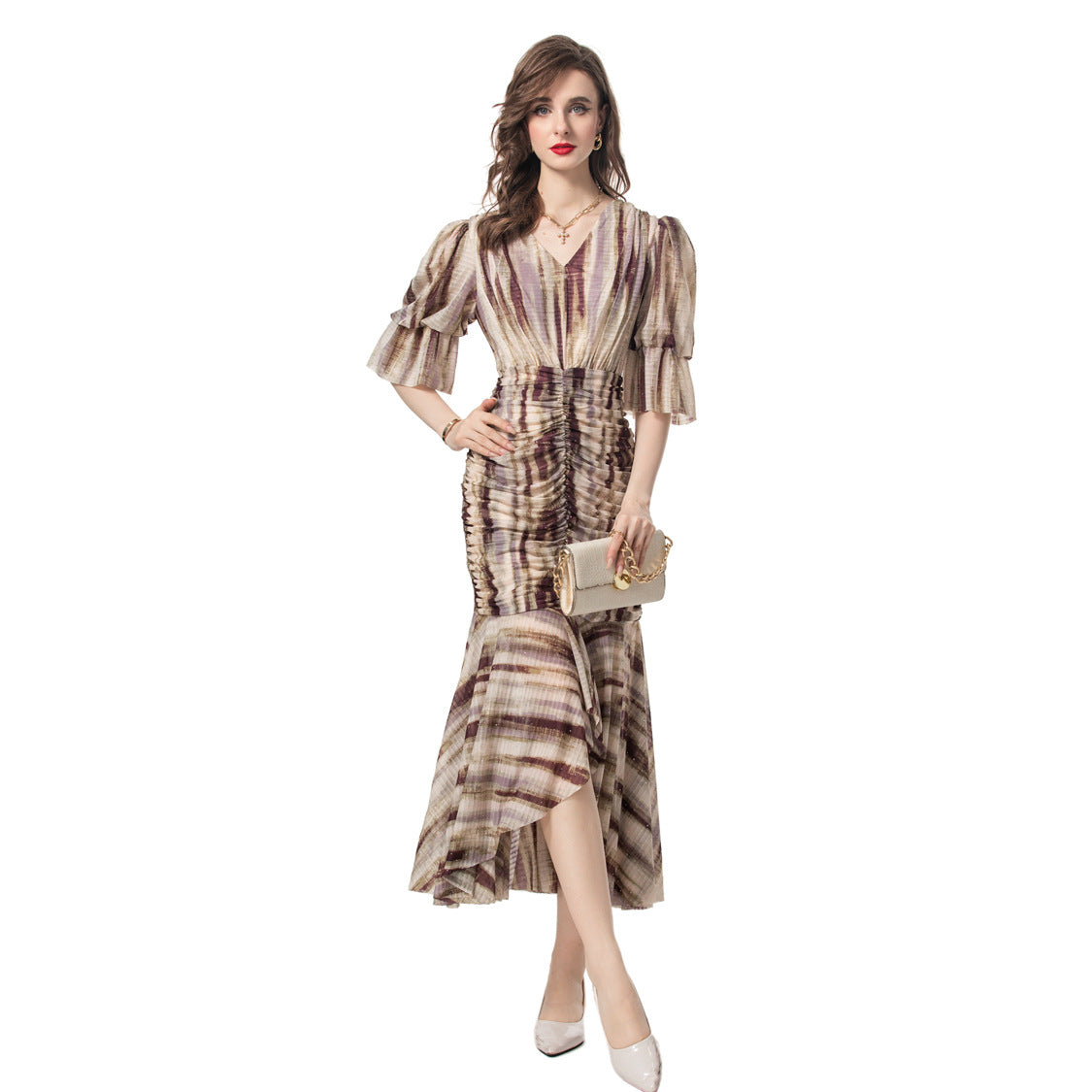 Summer fashion outfit with fashionable printed fish tail and hip bag dress
